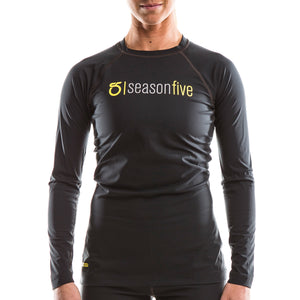 An image of a woman wearing a Women’s Barrier Long-Sleeve Crew-Neck Shirt from SeasonFive.